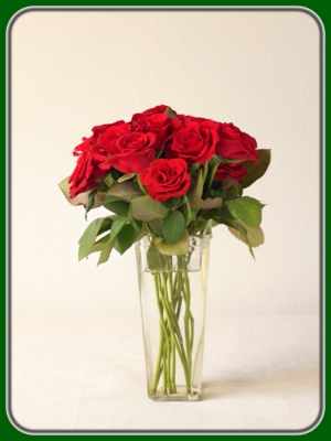 Tied Red Roses in Glass Vase