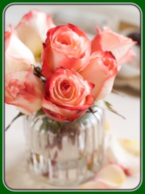 Peach and Pink Roses in Glass Vase