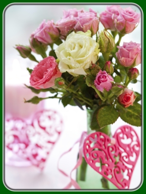 White and Pink Roses in Green Glass Vase