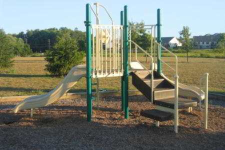 Playground surfacing using cedar chips