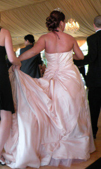 peach wedding gown, bustled back lots of buttons