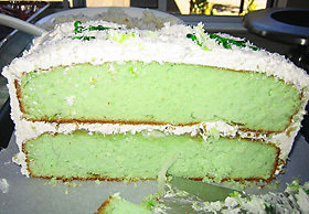 green cake with white frosting