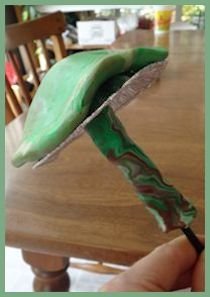 green cap and matching clay stem