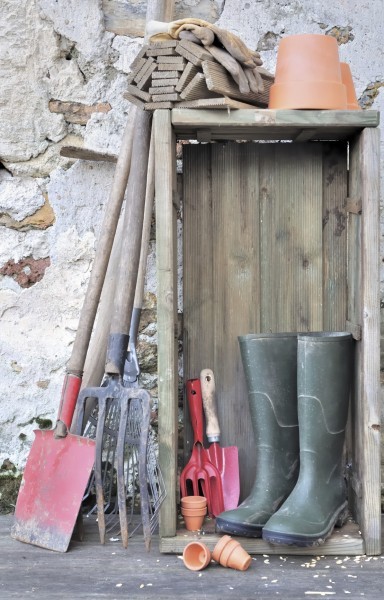 equipment and gardening tools in a rustic setting