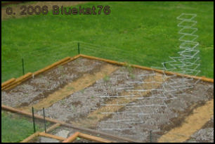 garden rows covered with slushy-looking layer of hydrated polymer crystals