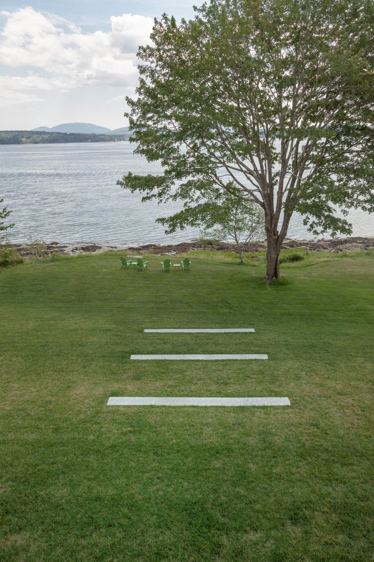 06-Matthew-Cunningham-Landscape-Design-Clamshell-Alleylawn-pavers-adirondack-chairs-granite-maine-gardenista